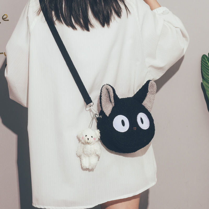 Circular shoulder and crossbody bag made from polyester - trendy fashion accessory